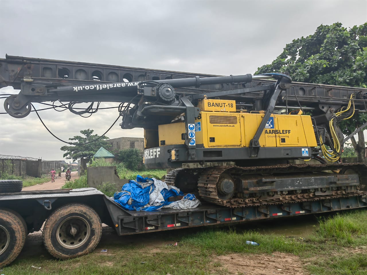 Banut-18 driven piling rig arriving on a low-loader trailer